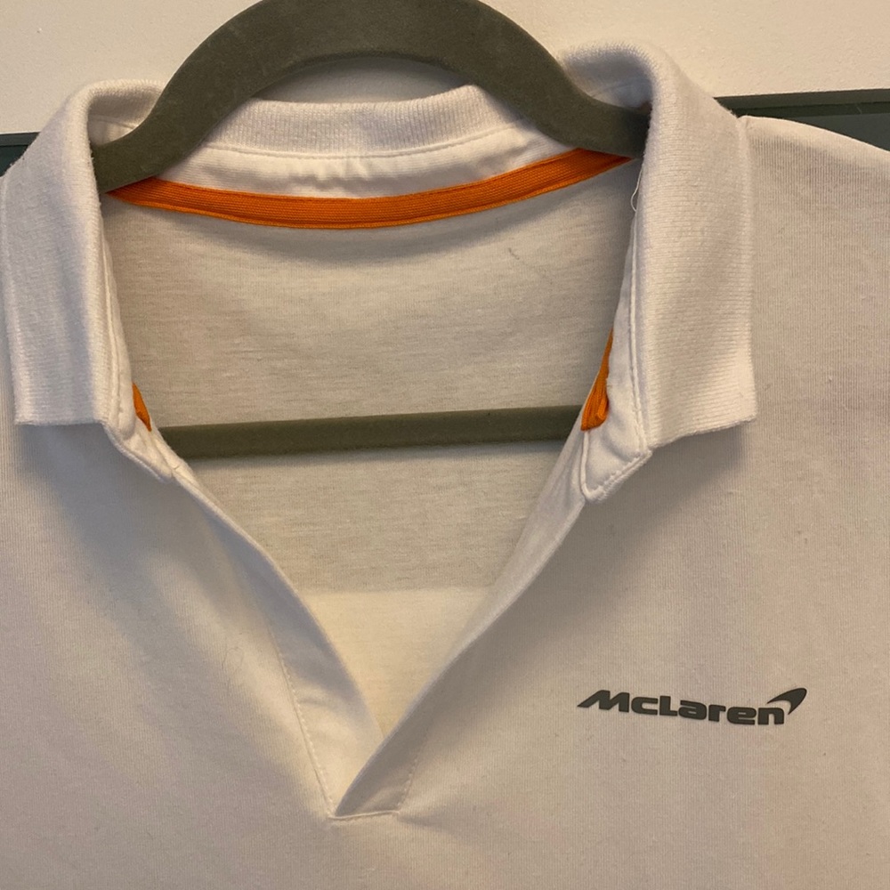 Two (2) McLaren white collared knit “polo” shirts